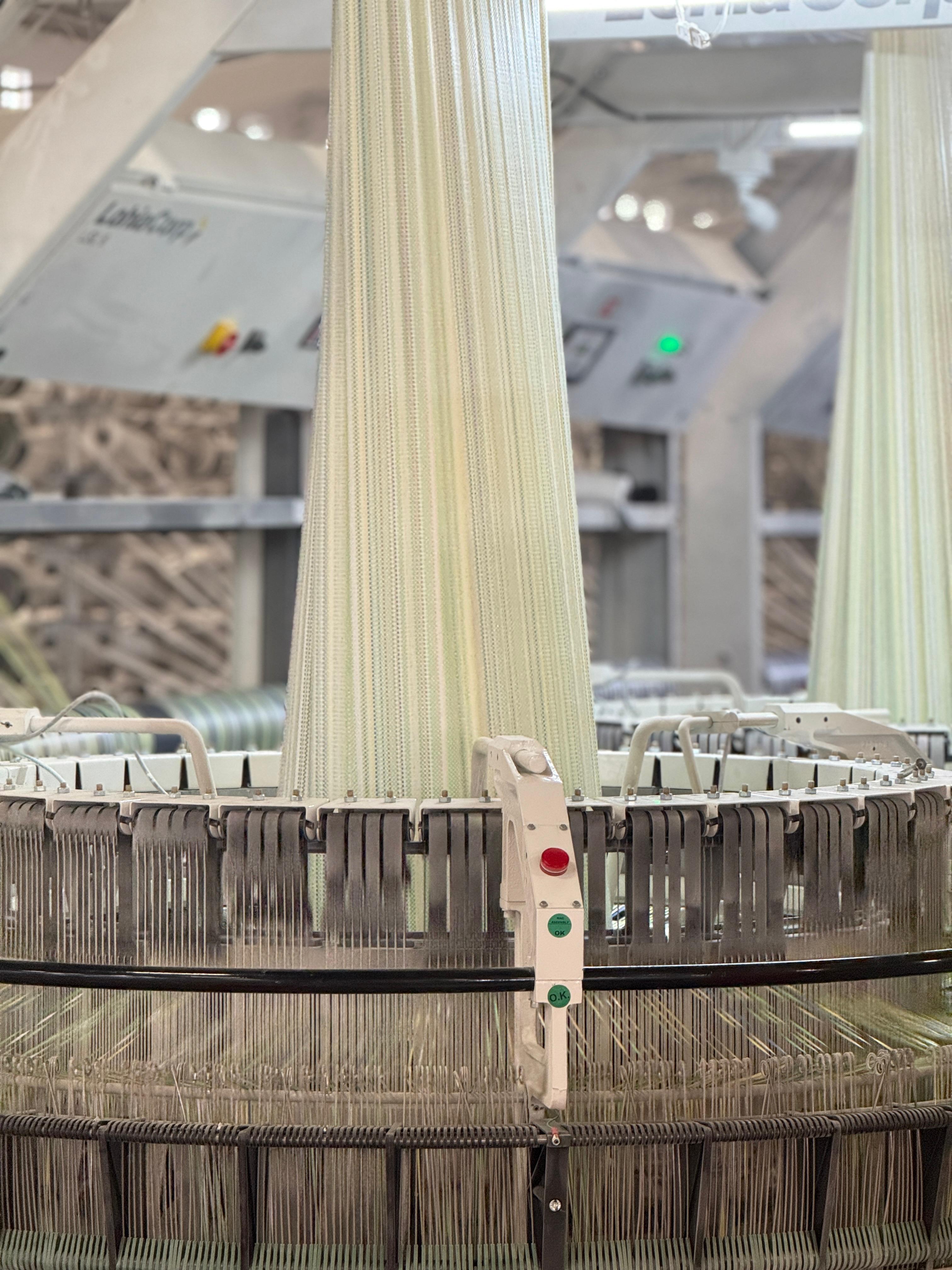 High-resolution manufacturing unit showing advanced weaving machinery